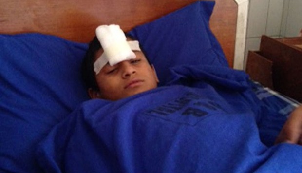 An injured student is getting treated at a hospital in Lalitpur. Photo courtesy: Kokila KC/The Himalayan Times
