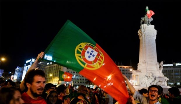 Portugal supporters celebrate their team\'s victory against France in the Euro 2016 final in Paris, at Marques de Pombal square in Lisbon.