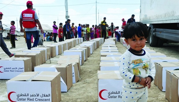 QRCS distributes food packages to poor families in Iraq