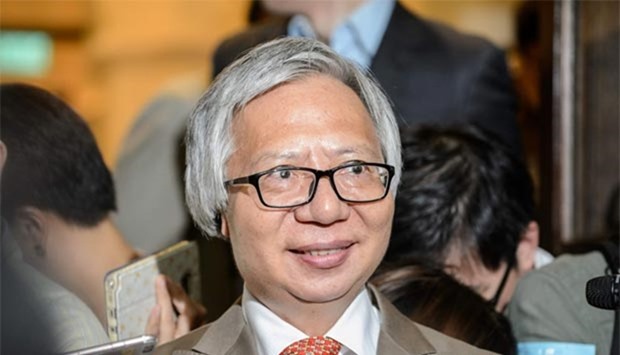 Hong Kong property tycoon Thomas Kwok speaks to the press after he was granted bail at the Final Court of Appeal in Hong Kong on Tuesday.