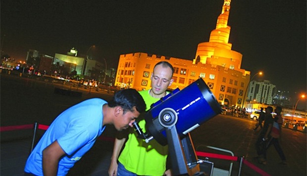 Egyptian astronomer Amro Mahmoud gives Souq Waqif visitors a chance to see some planets through his 