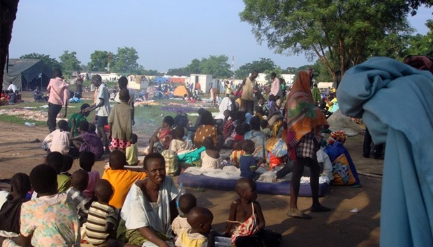 Displaced South Sudanese families sit in a camp for internally displaced people in the United Nations Mission in South Sudan (UNMISS) compound in Tomping, Juba, South Sudan.  Reuters