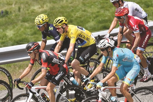 Colombiau2019s Nairo Quintana (second from left) and Great Britainu2019s Chris Froome (centre) ride during the 197km tenth stage of the 103rd edition of the Tour de France between Escaldes-Engordany and Revel yesterday. (AFP)