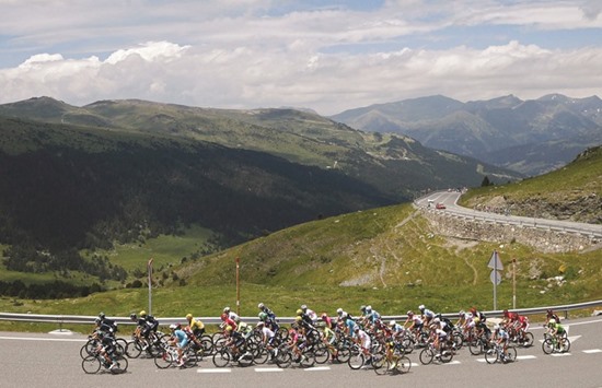 A pack of riders cycles during stage 10 of the Tour de France yesterday. (Reuters)