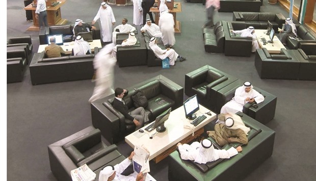 Investors move through the Dubai Financial Market. Dubai stocks jumped 1.3% yesterday, their sixth straight positive session either side of Eid.