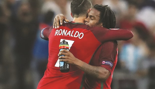   Portugalu2019s Renato Sanches (right) celebrates his goal with teammate Cristiano Ronaldo during the Euro 2016 quarter-final against Poland in Marseille on Thursday. (AFP)
