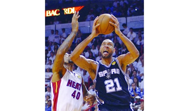 File photo  of Tim Duncan (R) of the San Antonio Spurs.