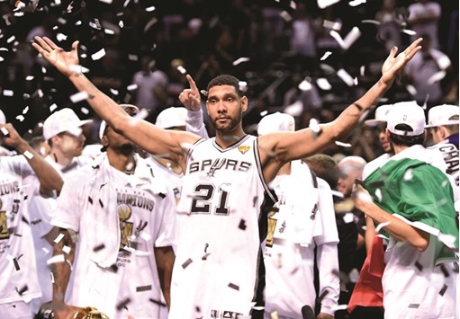 In this June 15, 2014, picture, San Antonio Spurs forward Tim Duncan celebrates after game five of the 2014 NBA Finals at AT&T Center in San Antonio, Texas. The Spurs beat the Heat 104-87 to win the NBA Finals. (USA TODAY Sports)