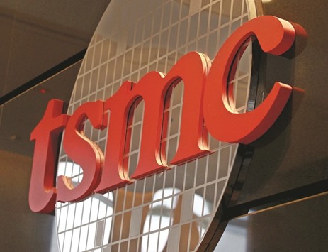 The logo of Taiwan Semiconductor Manufacturing Co (TSMC) is seen at its headquarters in Hsinchu, northern Taiwan. The firmu2019s aid income in the three months to September was expected to increase to Tw$254bn-$257bn (around $8bn), up about 20% from a year earlier.