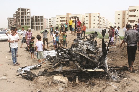 The site of a car bomb attack that targeted the convoy of Aden governor al-Zubaidi yesterday.