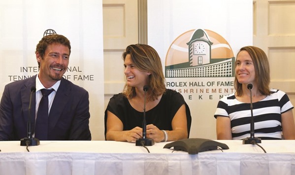 (From left) Marat Safin of Russia, Amelie Mauresmo of France and Justine Henin of Belgium address the media before being inducted into the International Tennis Hall of Fame in Newport, Rhode Island, yesterday. (Reuters)