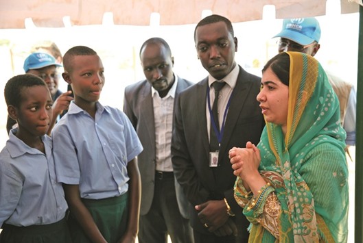 Nobel Peace Prize laureate Malala Yousafzai meeting Burundian refugees at the Mahama refugee camp in Rwanda.
