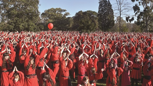 Kate Bush fans perform a dance during a celebration to mark u2018The Most Wuthering Heights Day Everu2019 in Melbourne yesterday.