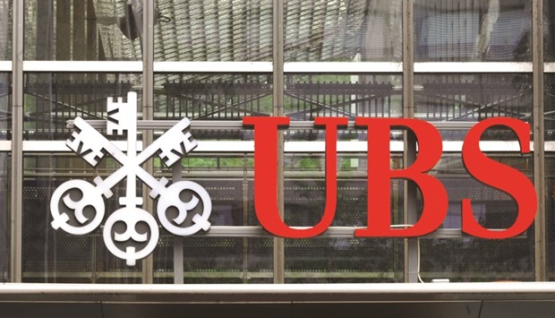 UBS logo is seen at its headquarters in Zurich. The bank is seeking to double its staff in China over five years, as it adds about 600 people in areas from wealth management to investment banking.