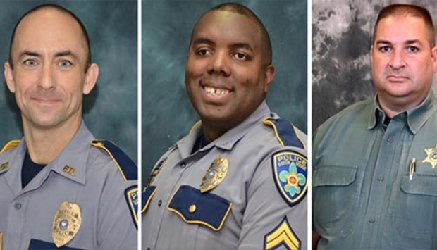 Baton Rouge police officers Matthew Gerald and Montrell Jackson and Baton Rouge Parish Deputy Brad Garafalo are pictured left to right. A black veteran shot dead the three officers in Baton Rouge on Sunday.
