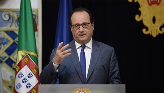 French President Francois Hollande, on a visit to Portugal, addresses a press conference in Lisbon on Tuesday.