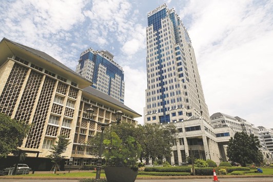 A general view of Bank Indonesiau2019s headquarters in Jakarta. Changes to Indonesian taxation rules are buoying bond prices. Bank Indonesia estimates the tax amnesty  programme will result in $42.8bn of inflows and boost 2016 economic growth to 5.33% from 5.03%.