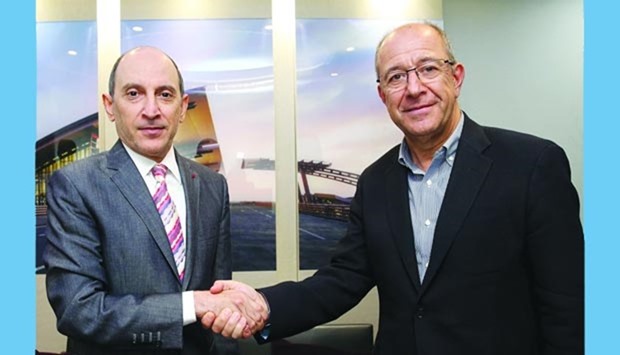 Qatar Airways Group chief executive Akbar al-Baker with Manel Arroyo, vice-president of marketing and communication, FC Barcelona.