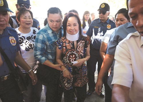File photo of former president Gloria Macapagal Arroyo arrives to vote in the national elections in her hometown of Lubao, Pampanga province, north of Manila on May 9 this year.