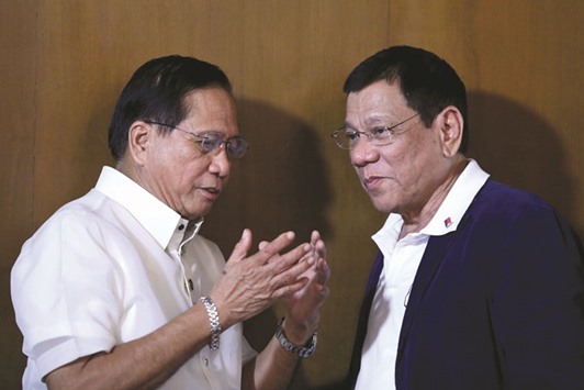 Philippines President Rodrigo Duterte listening to Secretary Jesus Dureza, of the Office of the Presidential Adviser on the Peace process (OPAPP), during a meeting at Malacanang Palace in Manila. Duterte is pushing for a new law to create an autonomous area for the Muslim minority to help end a decades-long separatist rebellion.