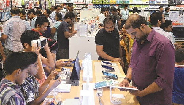 Many residents spend more on gadgets during this time of the year. PICTURES: Noushad Thekkayil