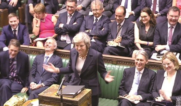 In this video grab taken from footage broadcast by the UK Parliamentary Recording Unit (PRU) via the Parliament TV website on July 20, 2016 shows British Prime Minister Theresa May speaking during Prime Ministers Questions at the House of Commons in London.