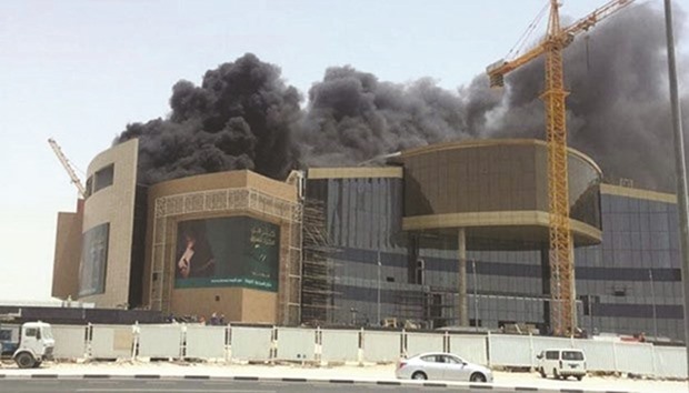 Black smoke emanating from the upcoming Tawar Mall yesterday.