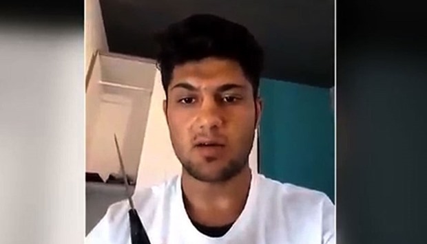An image grab taken from a video released on July 19, 2016 by Aamaq News Agency, an online service affiliated with the Islamic State (IS) group, purportedly shows teenager ,Mohammed Riyadh,, the Afghan refugee who slashed people on a German train the previous night.