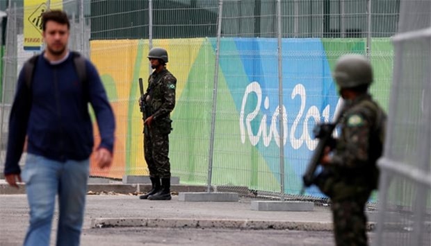 Soldiers of the Brazilian Armed Forces stand guard outside the Rio Olympics Park in Rio de Janeiro on Thursday.