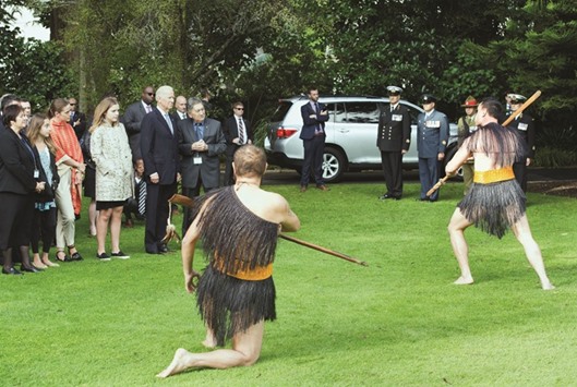 US Vice President Joe Biden stands with Maori elder and government official Lewis Moeau during a traditional Maori welcome ceremony at Government House in Auckland.