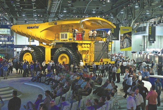 A Komatsu mining truck is displayed during a trade exhibition in Las Vegas. The Japanese mining equipment maker said yesterday that it would acquire 100% of the US rival Joy Global for $28.30 per share, about a 20 premium to Wednesdayu2019s closing price.