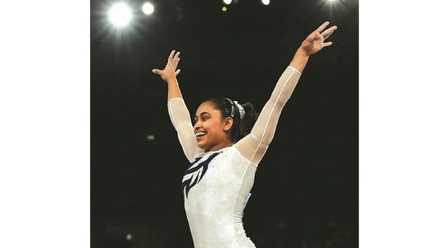 Indiau2019s Dipa Karmakar reacts after a successful vault during the womenu2019s gymnastics vault apparatus final at the 2014 Commonwealth Games in Glasgow on July 31, 2014.