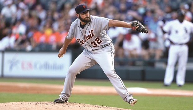 Detroit Tigers pitcher Michael Fulmer works against the Chicago White Sox in the first inning at US Cellular Field in Chicago.