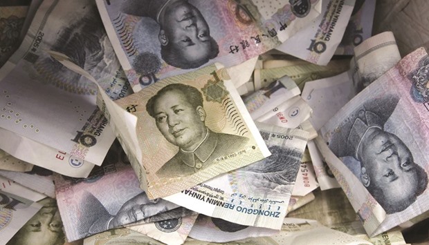Chinau2019s weakening currency has triggered an increase in the amount of cash leaving the country, according to analysis by Goldman Sachs.