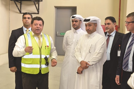 Fahad al-Khalifa among others at the Modern Recycling Factory (MRF) at the Mesaieed Industrial City.