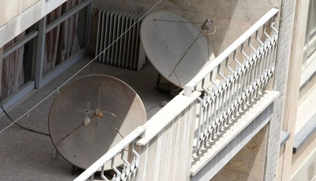 Satellite dishes on a balcony in a northern district of the Iranian capital Tehran.