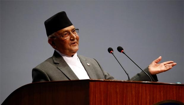Nepal's Prime Minister Khadga Prasad Sharma Oli speaks at the parliament where he announced his resignation in Kathmandu on Sunday.