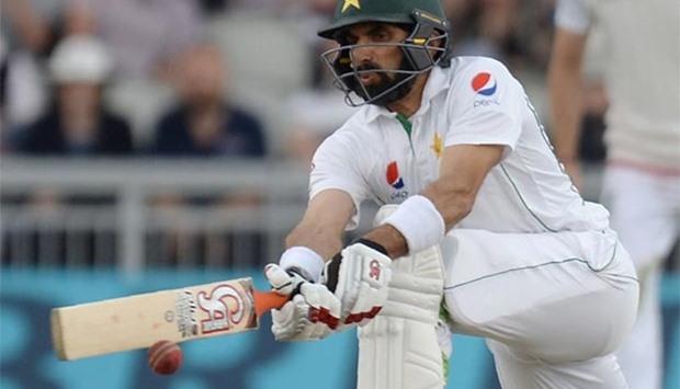 Misbah-ul-Haq plays a shot on the third day of the second Test against England at Old Trafford on Sunday.