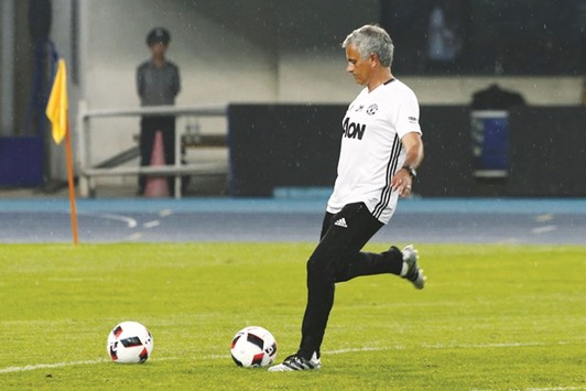 Manchester United coach Jose Mourinho during a training session in Beijing yesterday. (Reuters)