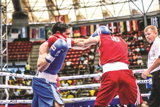 Unlike professionals, who fight bare-chested, Olympic boxers have always worn red and blue tops u2013 possibly for reasons of decency in the early days although they also protected against rope burn and absorb sweat.