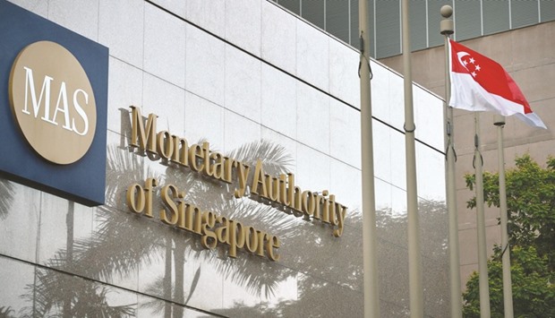 Singaporeu2019s central bank said its current monetary policy stance is appropriate and inflation may turn positive later this year.