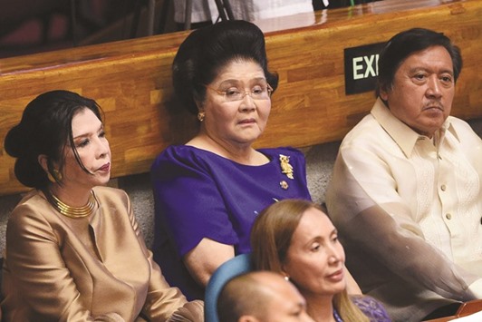 Former Philippine first lady Imelda Marcos (in blue) attends the legislature session and the State of the Nation Address yesterday.