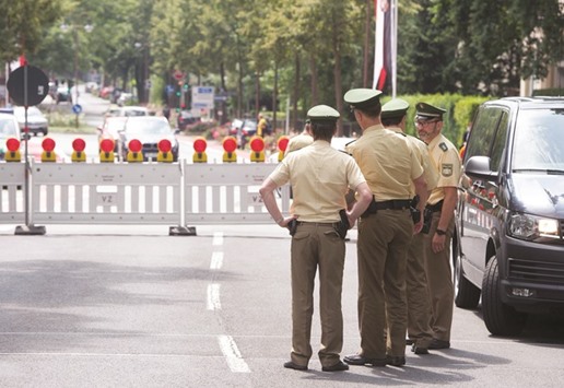 Police are seen at a checkpoint at the venue of Germanyu2019s legendary Bayreuth opera festival yesterday.