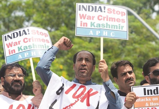 A supporter of All Parties Hurriyat (Freedom) Conference (APHC) chants slogans with others to condemn the violence in Kashmir during a demonstration in Islamabad yesterday.