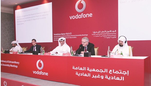 Vodafone chairman Rashid al-Naimi and CEO Ian Gray among others at the companyu2019s ordinary and extraordinary general assembly meetings in Doha yesterday.