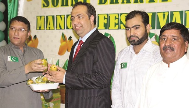 INAUGURATION: Commercial Attache Pakistan Embassy Arbab Qaisar with Anwar Ali Rana, Sohni Dharti chairman, left, at the opening of the festival.