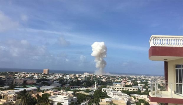 Smoke rises after one of the explosions in Mogadishu on Tuesday.
