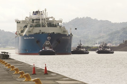 Royal Dutch Shellu2019s Maran Gas Apollonia tanker, transporting the first US shipment of liquefied natural gas (LNG) to pass through the expanded Panama Canal, navigates the waterway in Cocoli, on the outskirts of Panama City.