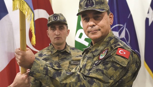 This photo taken on December 31, 2014 shows Major General Bakir during a ceremony to hand over responsibility to a Turkish unit at Kabul International Airport (KAIA) in Kabul. Two Turkish generals serving in Afghanistan have been detained in Dubai on suspicion of links to the failed coup against Erdogan. Bakir and Brigadier General Sener Topuc were detained at Dubai airport.