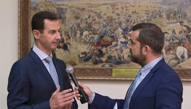 Syrian President Bashar al-Assad giving an interview to a Greek TV channel in Damascus on Wednesday.